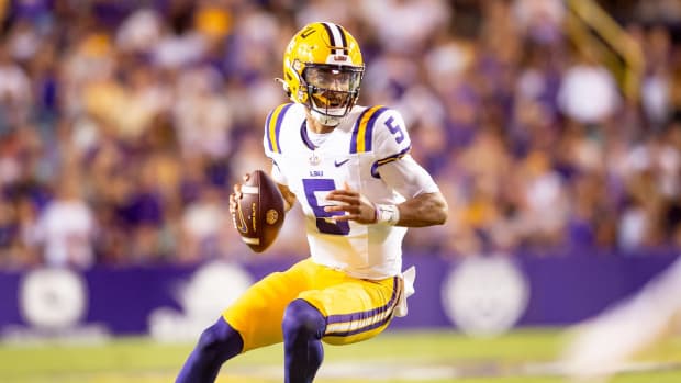 Tigers Quarterback Jayden Daniels 5 runs the ball as the LSU Tigers take on the Auburn Tigers at Tiger Stadium in Baton Rouge, Louisiana, Saturday, Oct. 14, 2023.  